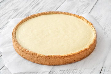 Traditional cheesecake on the wooden table