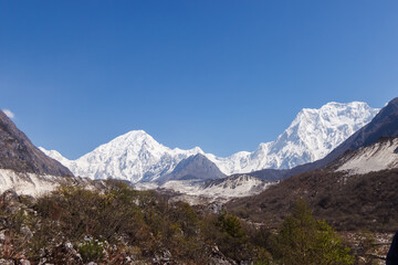 View of snow-capped mountain peaks in the Himalayas Manaslu region