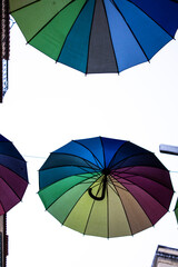 colorful umbrellas on pink street - Lisbon