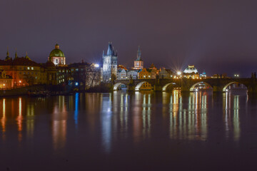 Fototapeta na wymiar City landscape at night, bridge over the river