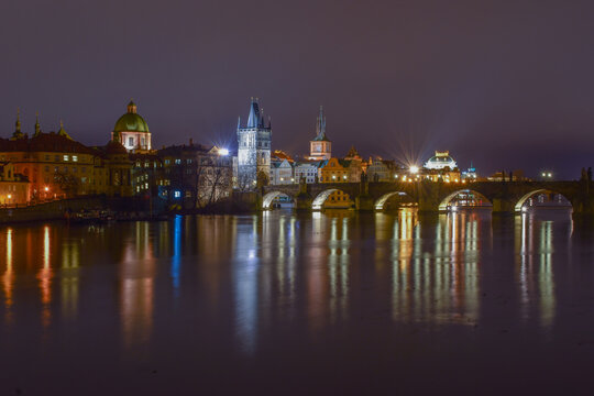 City landscape at night, bridge over the river