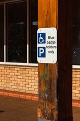 Blue badge sign. Disabled parking space sign. 
