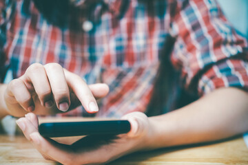 Close up of man using mobile phone.