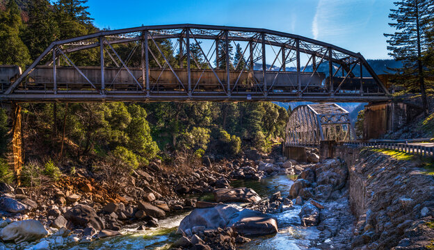 Railroad and State Highway truss bridges cross over the Feather River Gorge