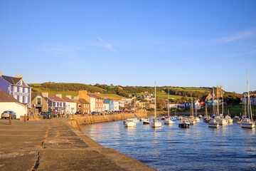 A beautiful scenery of the Aberaeron Harbour, High Tide, United Kingdom