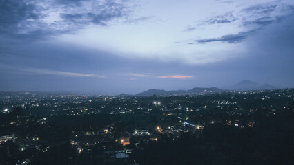 Cisarua-Bogor, Indonesia. February 2022 : blue hour, beautiful view from the top of the mountain