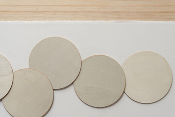 wood and paper with circles