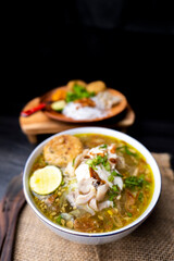 Soto Ayam is a traditional Indonesian soup mainly composed of broth, chicken and vegetables