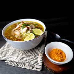 Soto Ayam is a traditional Indonesian soup mainly composed of broth, chicken and vegetables