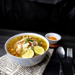 Soto Ayam is a traditional Indonesian soup mainly composed of broth, chicken and vegetables