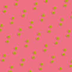 Colorful fruit pattern of fresh limes slices on pink background. Top view. Flat lay. Pop art design