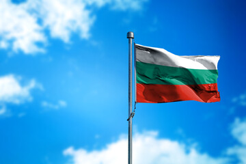 Flag of Bulgaria on the wind against blue sky