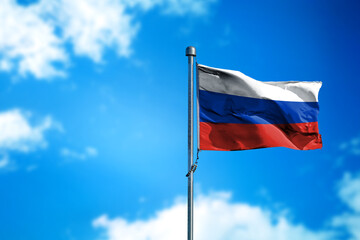 Flag of Russia on the wind against blue sky