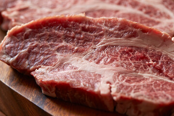 raw meat on a cutting board