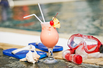 Cocktails and snorkeling equipment at the resort pool