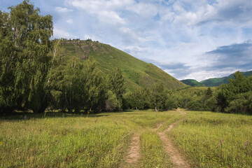Fototapeta na wymiar Green mountains landscape in summer season. Nature landscape. Beautiful Koksu river valley.