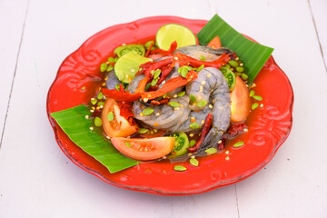 salad with shrimp mixed in isan style,loud and often painfully spicy flavours