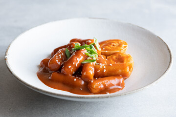 Tteokbokki, rice stick in spicy sauce, traditional korean cuisine, selective focus