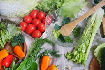 fresh vegetables on a wooden table. Kitchen ingredients. Spring vitamins. Detox. Healthy lifestyle 