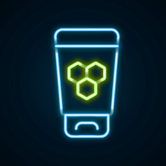 Glowing neon line Cosmetic tube with honey icon isolated on black background. Natural skin care. Colorful outline concept. Vector