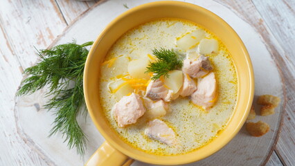 Creamy fish soup with salmon, potatoes, onions , carrots, dill and celery . Kalakeitto- traditional...