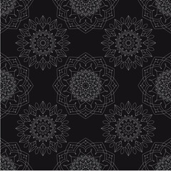 Seamless vector mandala pattern in black color on a white background. Ethnic drawing.