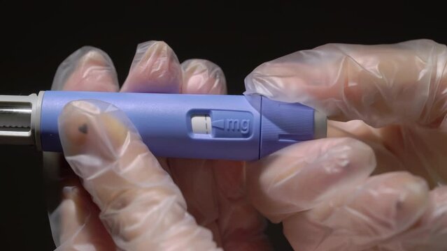 Doctor, nurse, patient. Medication insulin, subcutaneous injection for diabetic.