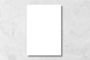 blank white poster with black frame on clean wall background for interior design concept	