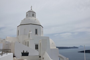 Fototapeta na wymiar View of an orthodox Greek chapel in Fira Santorini Greece