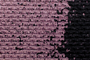 Purple textured background with black spot