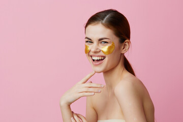 young woman skin care face patches bare shoulders hygiene isolated background