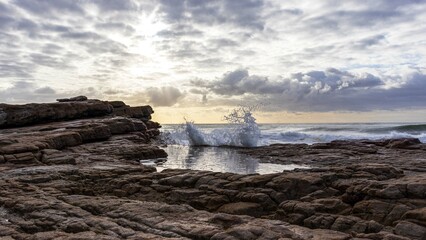 Seascape view with rocks and waves of Uvongu in Margate, the South Coast of South Africa