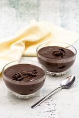 Supangle dessert on gray background. A chocolate pudding with a semi-solid, semi-liquid consistency.