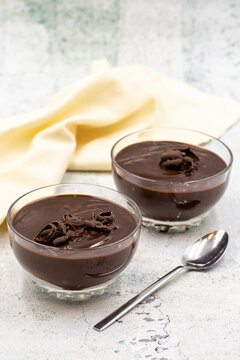 Supangle dessert on gray background. A chocolate pudding with a semi-solid, semi-liquid consistency.