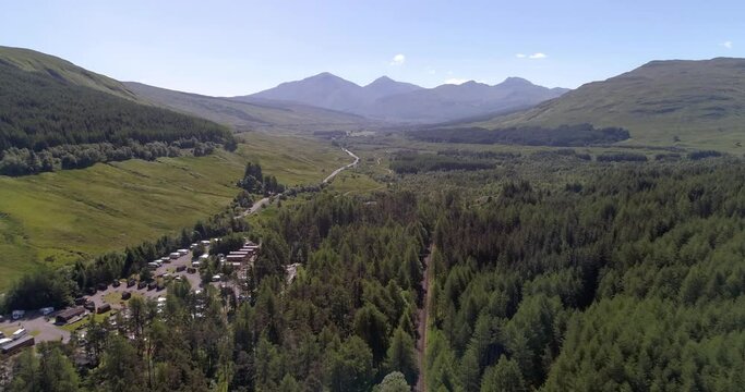 Aerial pushing shot over Tyndrum looking south east towards Ben More