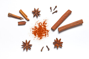 Spices anise, clove, paprika, cinnamon on white background.