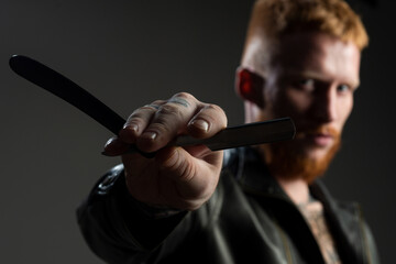 Brutal barber. Barber scissors, barber shop. Vintage barber shop, shaving. Barbershop blade. Man with vintage razor.