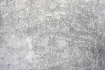 Obraz na płótnie Canvas Abstract cracked plaster wall background.