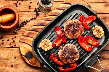 Fried beefsteak in bacon