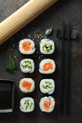 Concept of tasty food with sushi rolls, top view