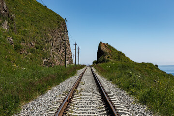 Fototapeta na wymiar Circum Baikal Railway. Railway along the shore of Lake Baikal.