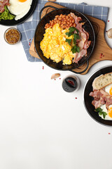 Concept of tasty breakfast on white background