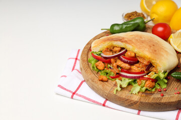 Concept of tasty food with pita with chicken, space for text