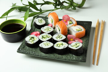 Concept of tasty food with sushi rolls, close up