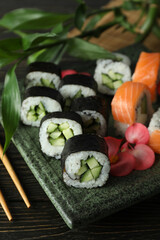 Concept of tasty food with sushi rolls, close up