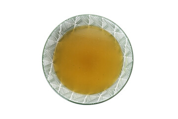 Plate with broth isolated on white background
