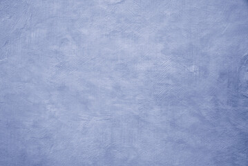 concrete wall structured with spatula technique, grayish blue
