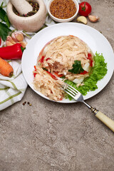 Delicious chicken aspic on a plate on concrete table