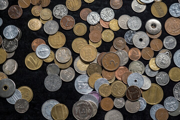 Miscellaneous isolated coins on a black background