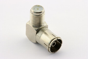 F-connector for connecting shielded coaxial cable close-up on a white background.